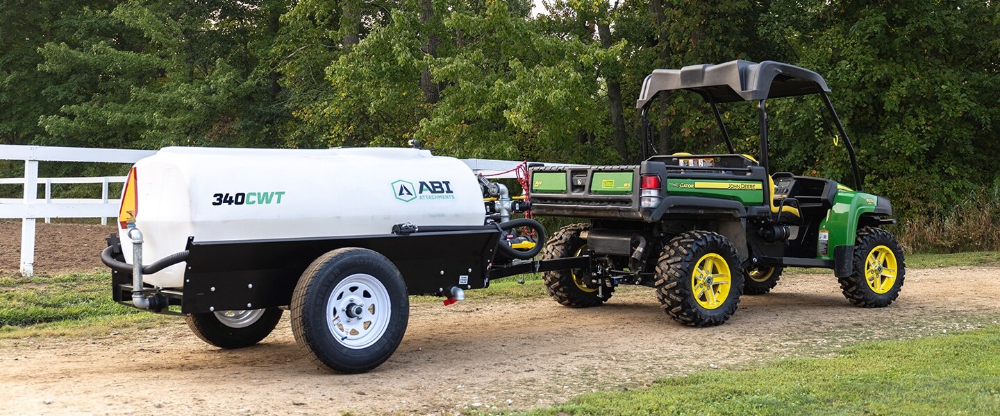 ABI Attachments 340 Gallon Compact Water Trailer attached to a UTV