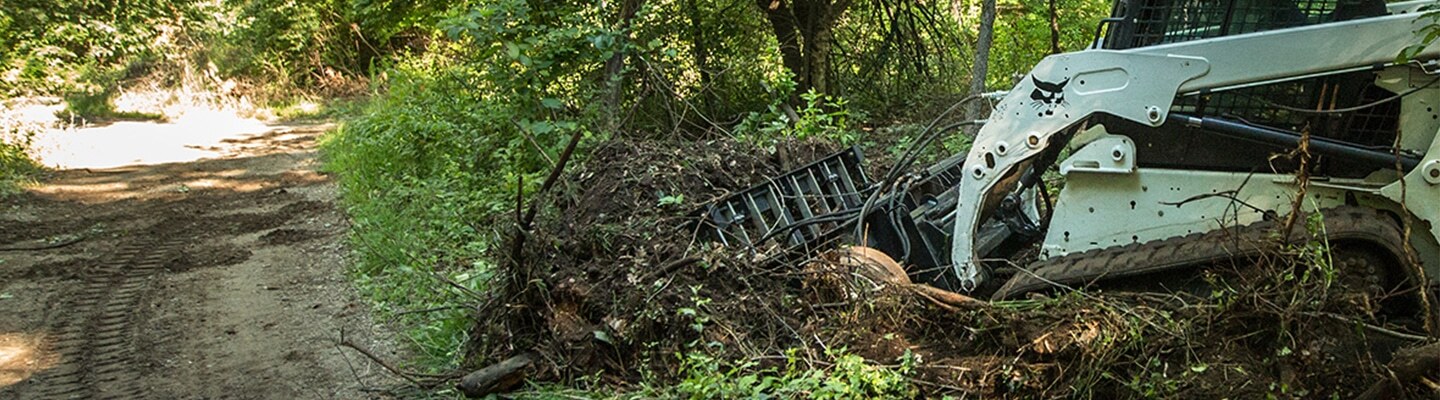 ABI Attachments SR2 performing post-storm repair on a path