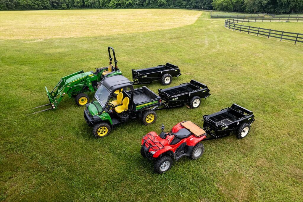 ABI Attachments 25 50 65 Cubic Foot Ground Drive Manure Spreader family lined up attached to an ATV, a UTV, and a compact tractor