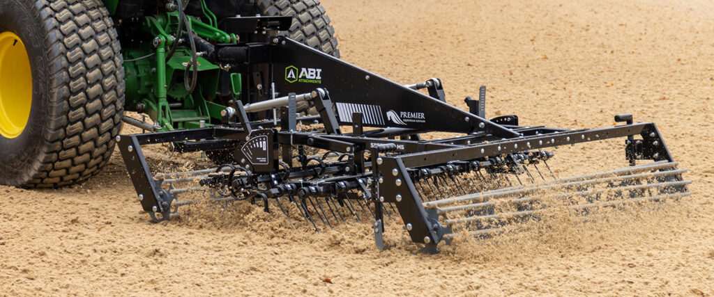 ABI Attachments SportPro being used in an outdoor synthetic footing arena