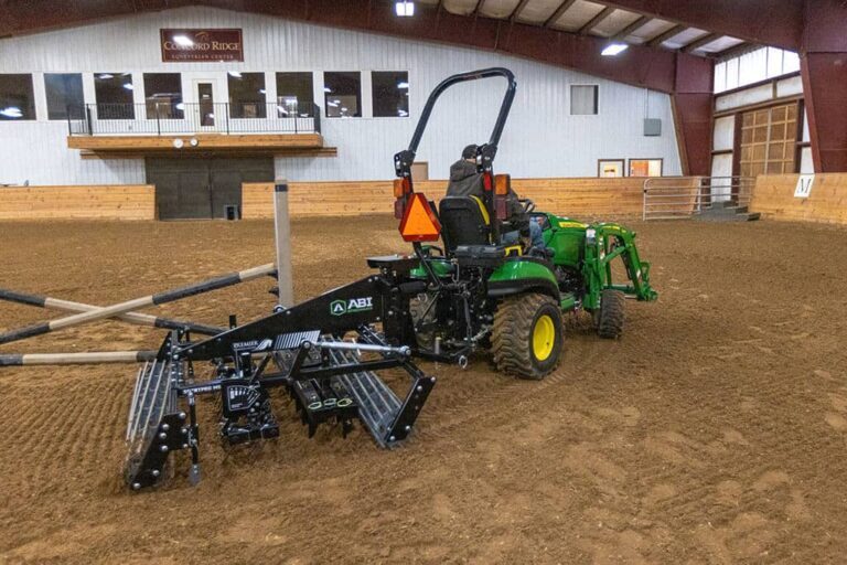 ABI Attachments SportPro M5 Arena Drag being used in an indoor arena with synthetic footing