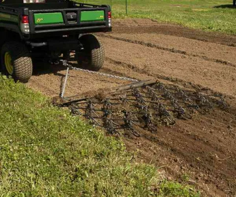 ABI ATV Chain Harrow in soil.