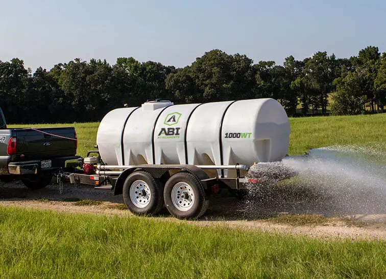 Truck Hauling 1000 Gallon Water Trailer Dust Abatement