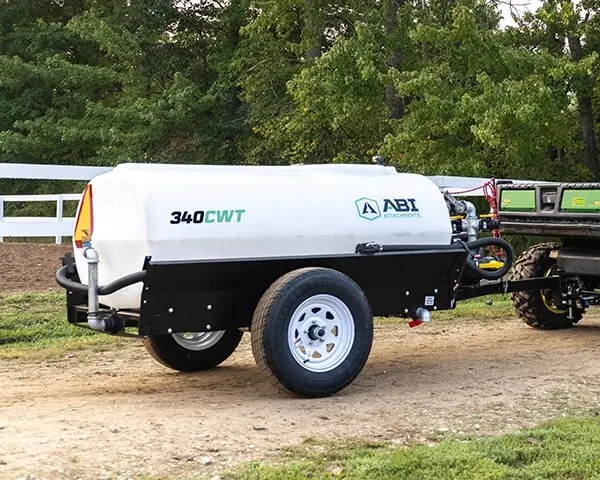 ABI Attachments 340 Gallon Compact Water Trailer attached to a UTV