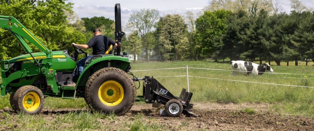 ABI Attachments TR3 clearing and leveling ground while attached to a tractor