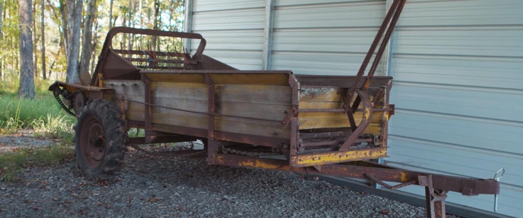 Antique rusted manure spreader