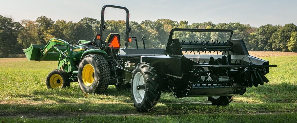 Rear view of an ABI Attachments 85 Cubic Foot Ground Drive Manure Spreader