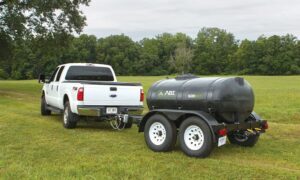Truck Hauling Potable Water Trailer