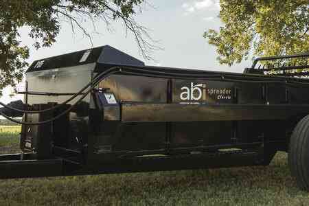 Huge manure spreader (largest manure spreader) that also shreds - 185