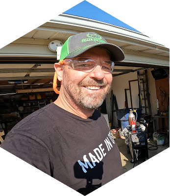 Joe Kapitany from Kapper Outdoors in front of an open garage